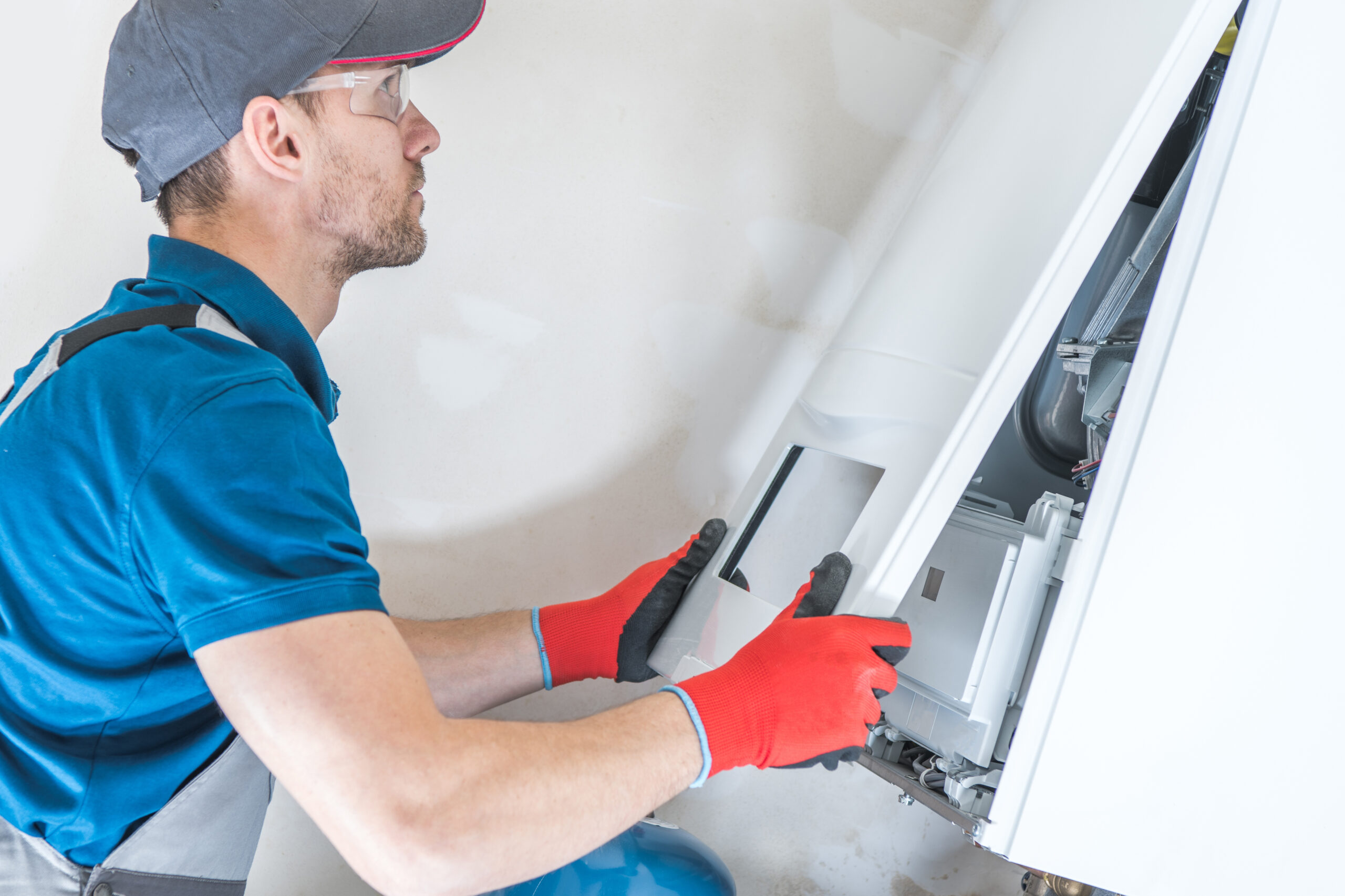 HVAC professional from Shaw Plumbing Heating and Air Conditioning Doing Furnace Repair in Spokane